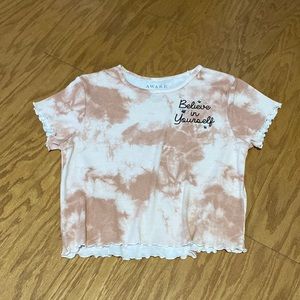 I am selling a short sleeved crop top by awake